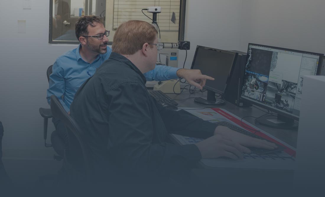 Engineers collaborating at McDanel